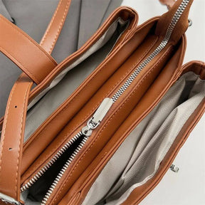 BOLSA DE OMBRO EM COURO